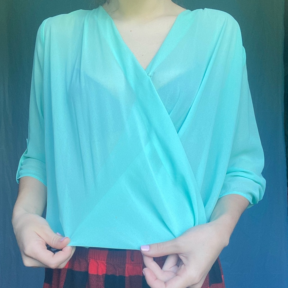 Donating soon! Iz Byer Small Light Blue Blouse Open Floral Back